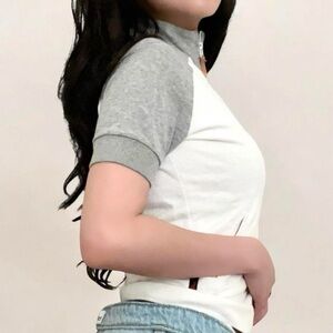 IÉNA JEANS® WOMEN’S ZIP TOP.